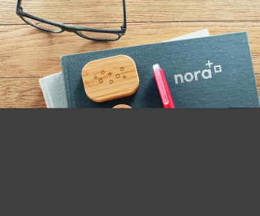 Logo trade liikelahjat mainoslahjat kuva: TWS-kuulokkeet bambukotelossa